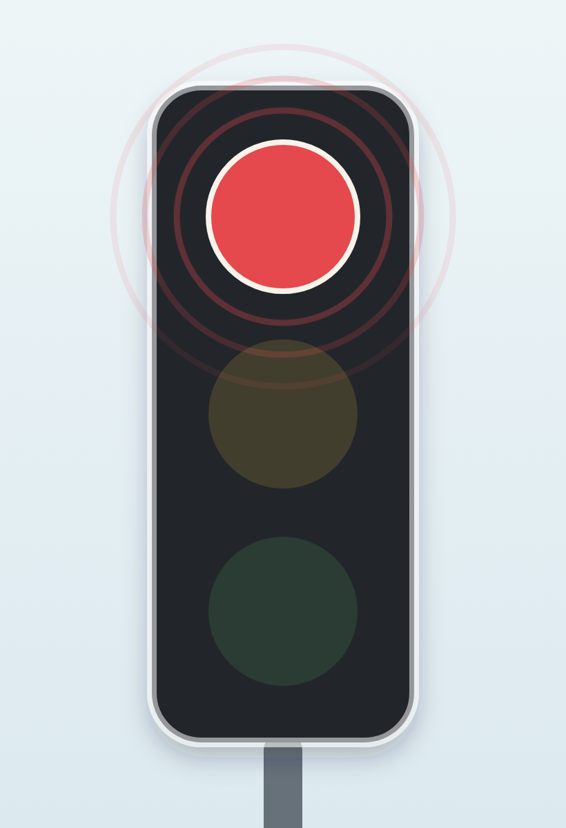What does a flashing red traffic light mean?