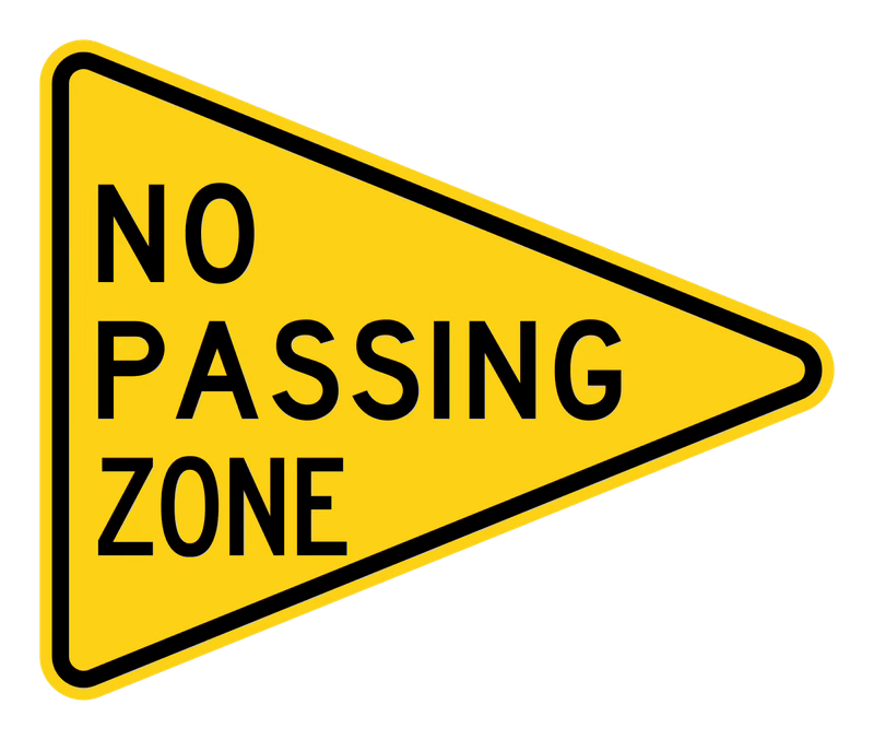 No Passing Zone Sign road sign — Yellow pennant on the left side of the road reading NO PASSING ZONE