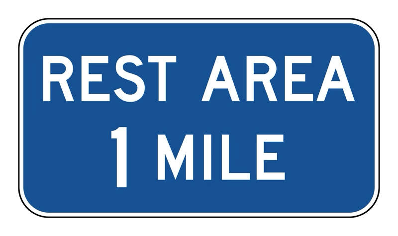 Rest Area Sign road sign — Blue rectangle reading REST AREA with distance